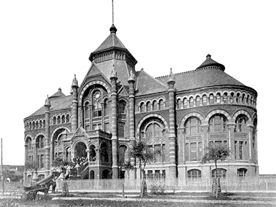 Historic photograph of the Ashbel Smith Building, known as Old Red, where the UTMB medical school opened in 1891.