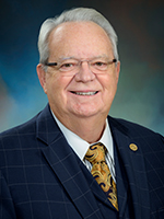 Headshot of Dr. Ben Raimer, sixth present at UTMB