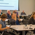 Attendees engage with technology during a 2026 LHWS lecture