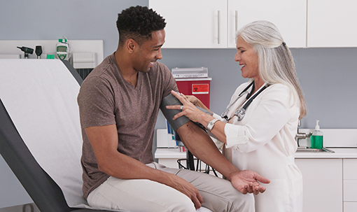 Young man getting a check-up at the Student Health clinic