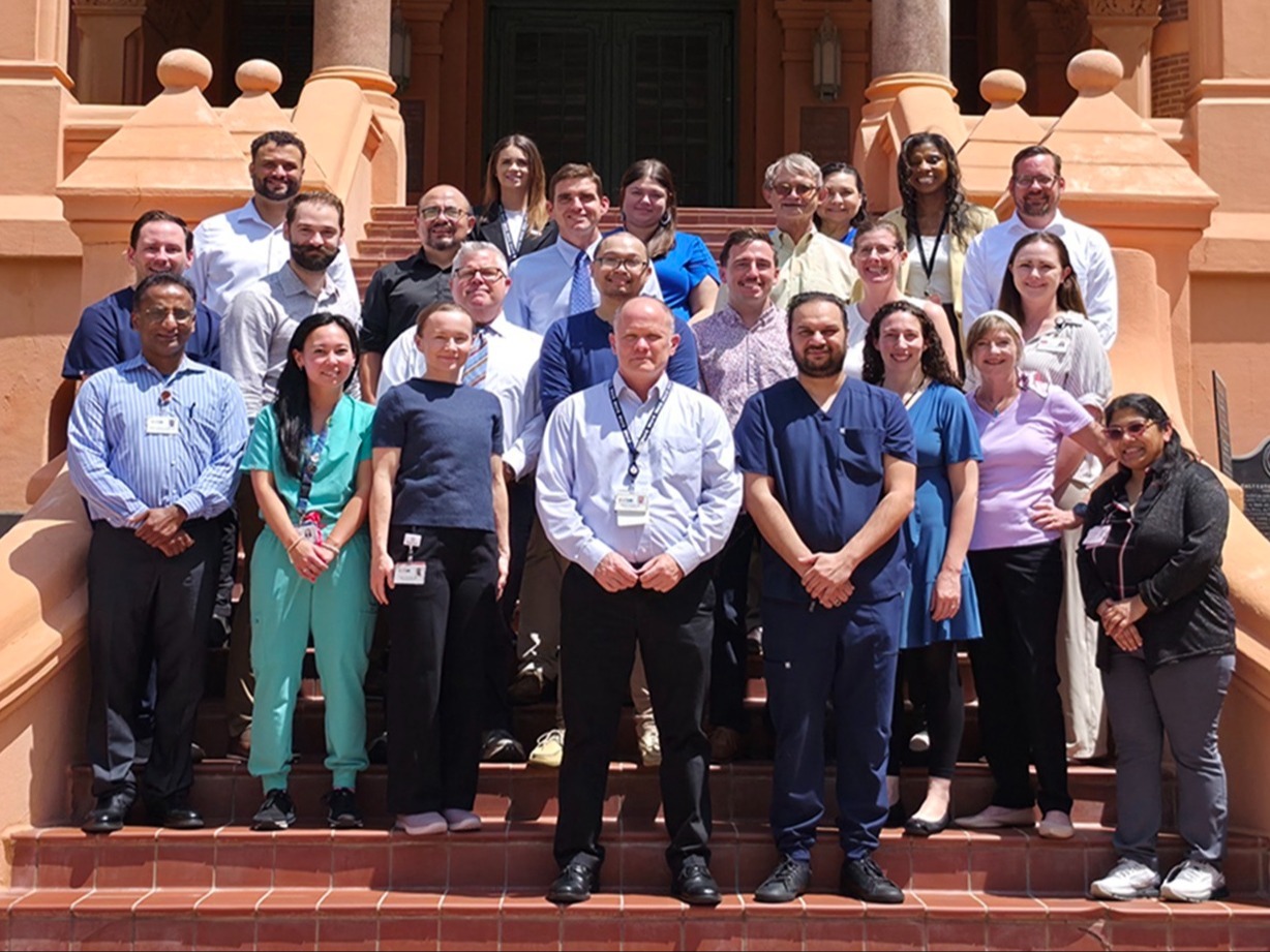 Infectious Disease Faculty Infectious Disease Faculty standing in front of Old Red