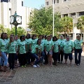 Preemie Reunion  with many people wearing green shirts