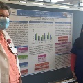 Research Poster manned by Richardson and Maria