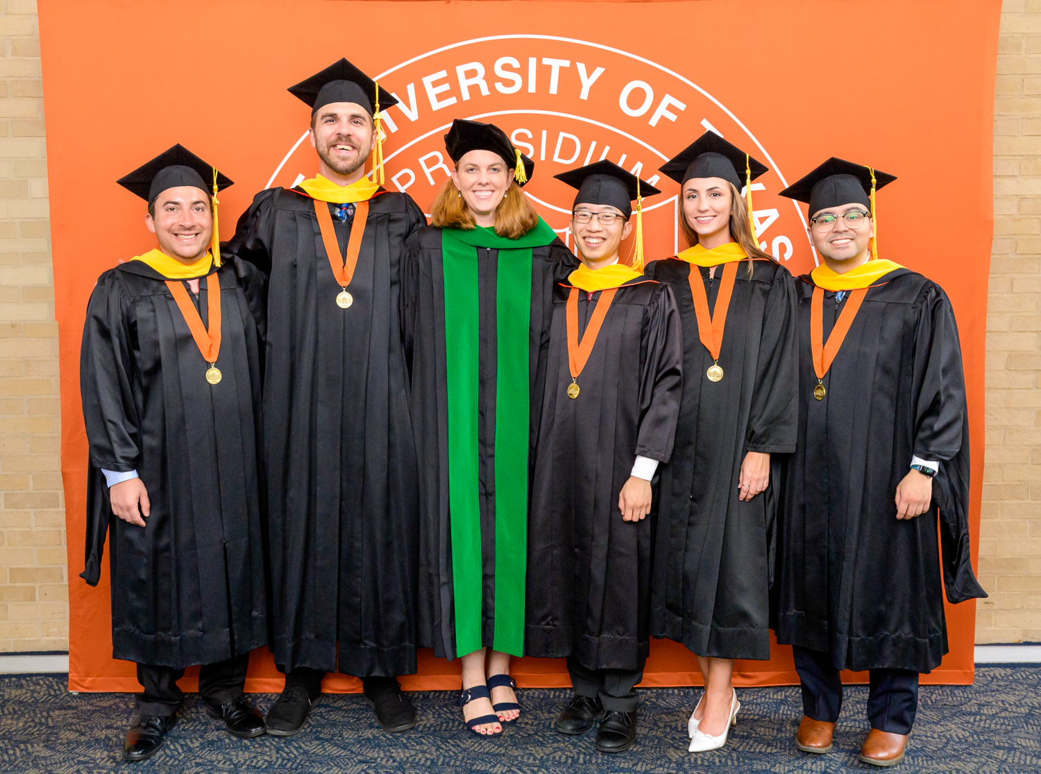 Graduates of the MS in Aerospace Medicine posing for a group photo at 2025 commencement Graduates of the MS in Aerospace Medicine posing for a group photo at 2025 commencement